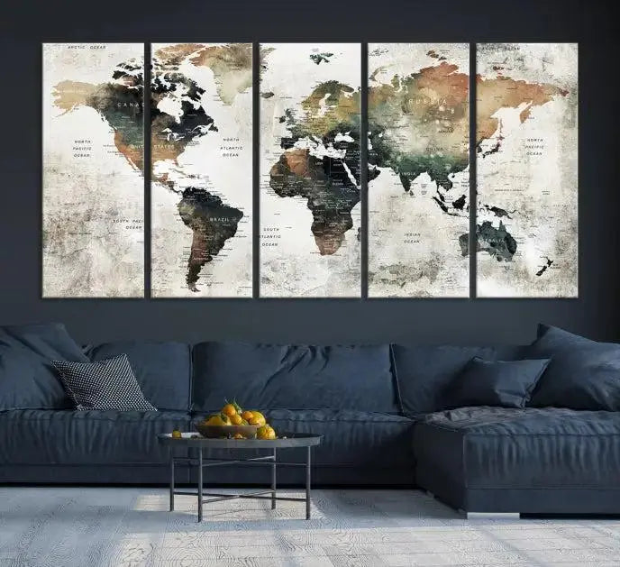 The dark wall is elegantly adorned with the Watercolor World Map Wall Art Canvas Print in a triptych style. Each canvas features a UV-protective coating and is ready to hang, seamlessly blending sophistication with practicality.