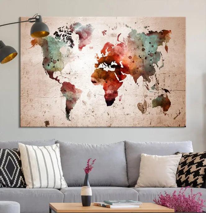 The living room features the Watercolor World Map Wall Art Canvas Print on gallery-wrapped, museum-quality canvases. Its UV-protective coating ensures the artwork's lasting vibrancy.