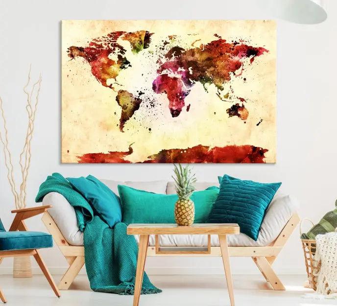 The "Watercolor World Map Wall Art Canvas Print" features three panels in vibrant colors on a gallery-wrapped, museum-quality canvas with UV-protective coating, decorating the wall.