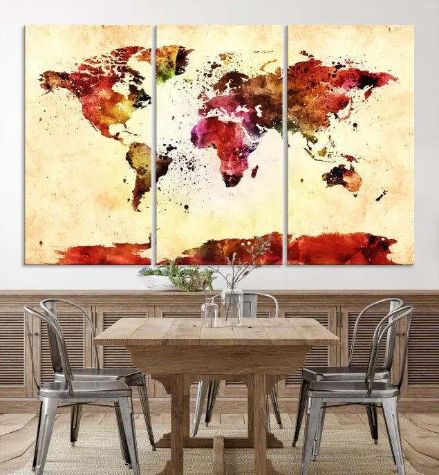 The "Watercolor World Map Wall Art Canvas Print" features three panels in vibrant colors on a gallery-wrapped, museum-quality canvas with UV-protective coating, decorating the wall.