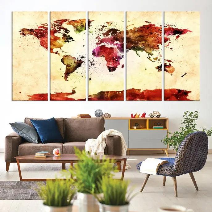 The "Watercolor World Map Wall Art Canvas Print" features three panels in vibrant colors on a gallery-wrapped, museum-quality canvas with UV-protective coating, decorating the wall.