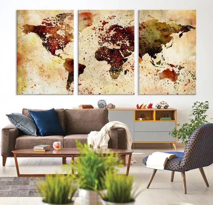 The "Watercolor World Map Wall Art Canvas Print" features three panels and is printed on museum-quality canvas with a UV-protective coating. It hangs elegantly in the modern living room.