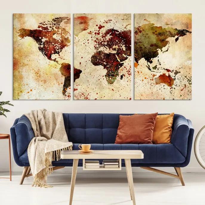 The "Watercolor World Map Wall Art Canvas Print" features three panels and is printed on museum-quality canvas with a UV-protective coating. It hangs elegantly in the modern living room.