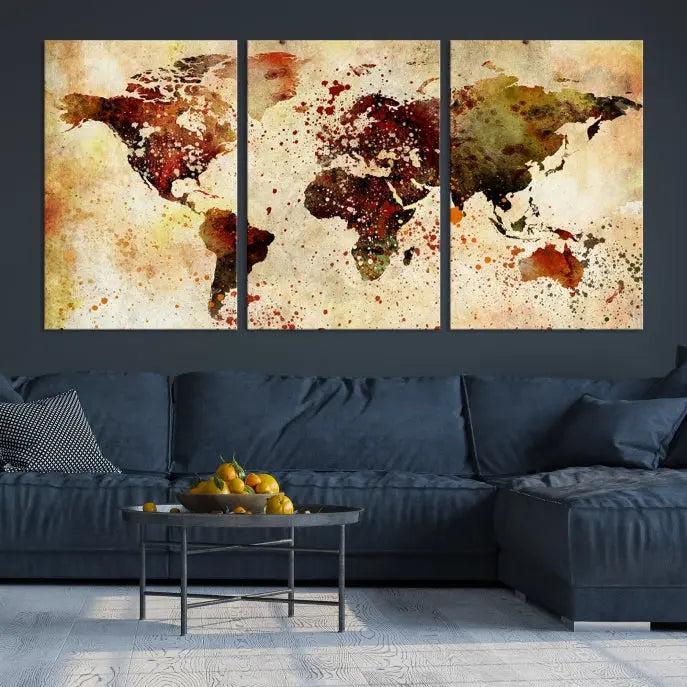 The "Watercolor World Map Wall Art Canvas Print" features three panels and is printed on museum-quality canvas with a UV-protective coating. It hangs elegantly in the modern living room.