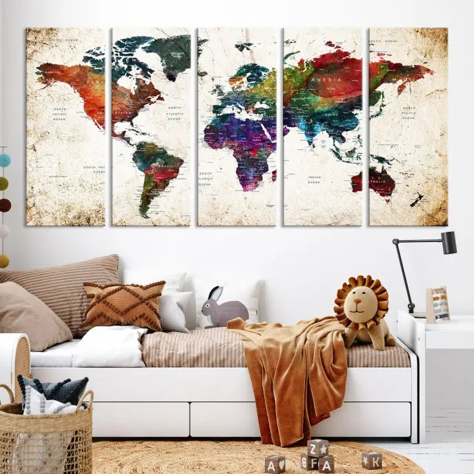 A three-panel Watercolor World Map Wall Art Canvas Print, crafted on museum-quality canvas with a UV-protective coating, is displayed against the dark wall. Ready to hang, it brings vibrant colors and sophistication to your space.