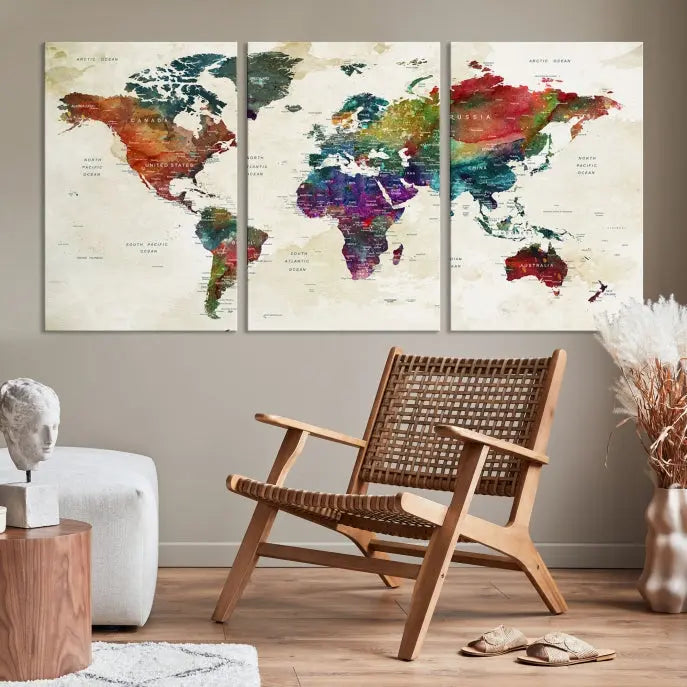 The room showcases the Watercolor World Map Wall Art Canvas Print, professionally framed on museum-quality pollycotton canvas.