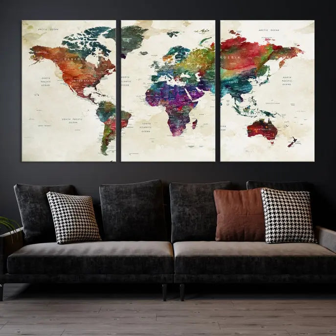 The room showcases the Watercolor World Map Wall Art Canvas Print, professionally framed on museum-quality pollycotton canvas.