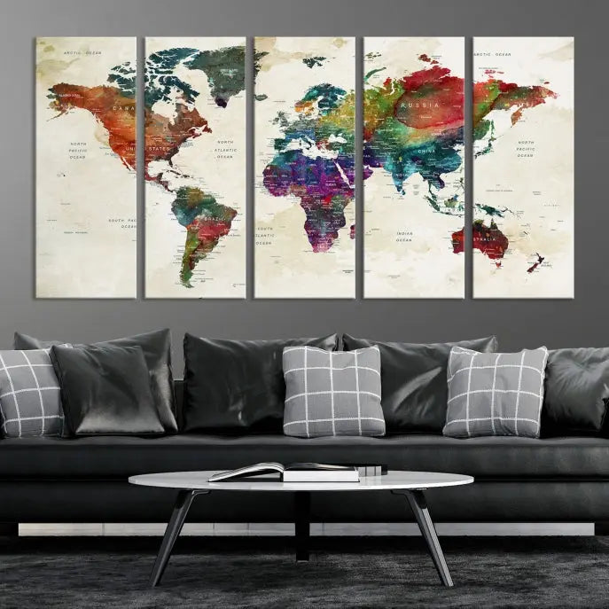 The room showcases the Watercolor World Map Wall Art Canvas Print, professionally framed on museum-quality pollycotton canvas.