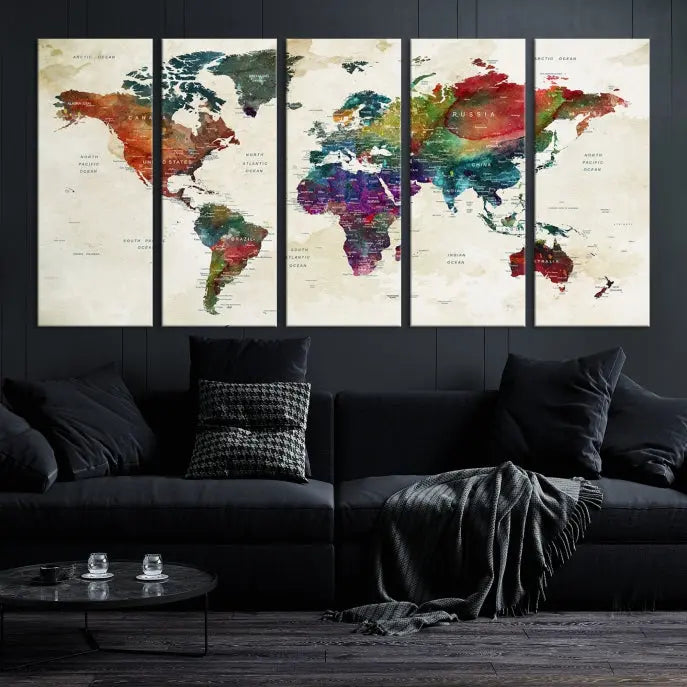 The room showcases the Watercolor World Map Wall Art Canvas Print, professionally framed on museum-quality pollycotton canvas.