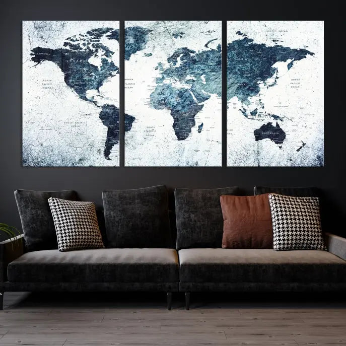 The "Watercolor World Map Wall Art Canvas Print," treated with a UV-protective coating to maintain its vivid colors, is displayed in a modern living room.