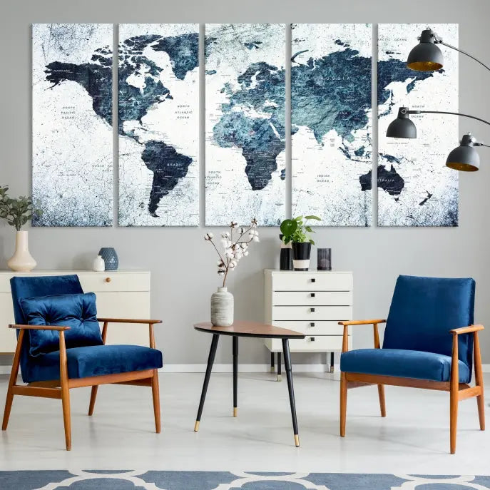 The "Watercolor World Map Wall Art Canvas Print," treated with a UV-protective coating to maintain its vivid colors, is displayed in a modern living room.