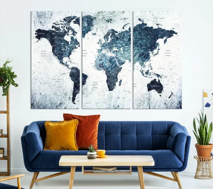 The "Watercolor World Map Wall Art Canvas Print," treated with a UV-protective coating to maintain its vivid colors, is displayed in a modern living room.