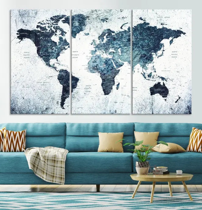 The "Watercolor World Map Wall Art Canvas Print," treated with a UV-protective coating to maintain its vivid colors, is displayed in a modern living room.