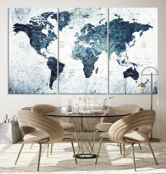 The "Watercolor World Map Wall Art Canvas Print," treated with a UV-protective coating to maintain its vivid colors, is displayed in a modern living room.