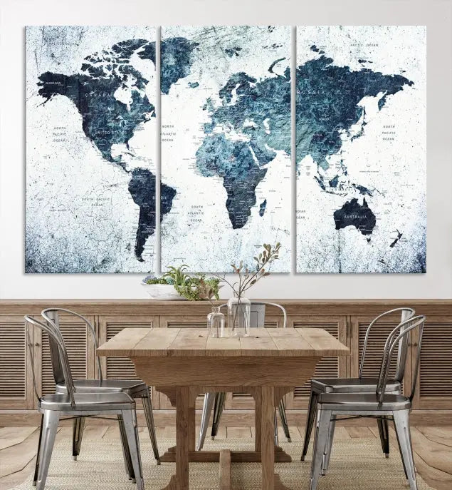 The "Watercolor World Map Wall Art Canvas Print," treated with a UV-protective coating to maintain its vivid colors, is displayed in a modern living room.