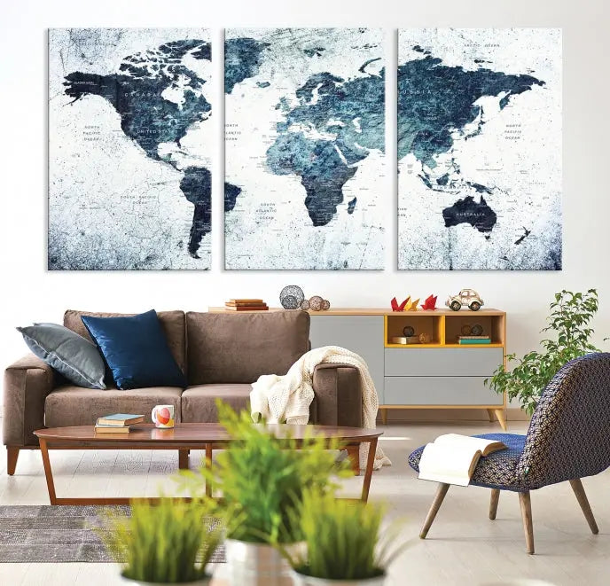 The "Watercolor World Map Wall Art Canvas Print," treated with a UV-protective coating to maintain its vivid colors, is displayed in a modern living room.