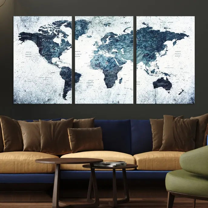 The "Watercolor World Map Wall Art Canvas Print," treated with a UV-protective coating to maintain its vivid colors, is displayed in a modern living room.