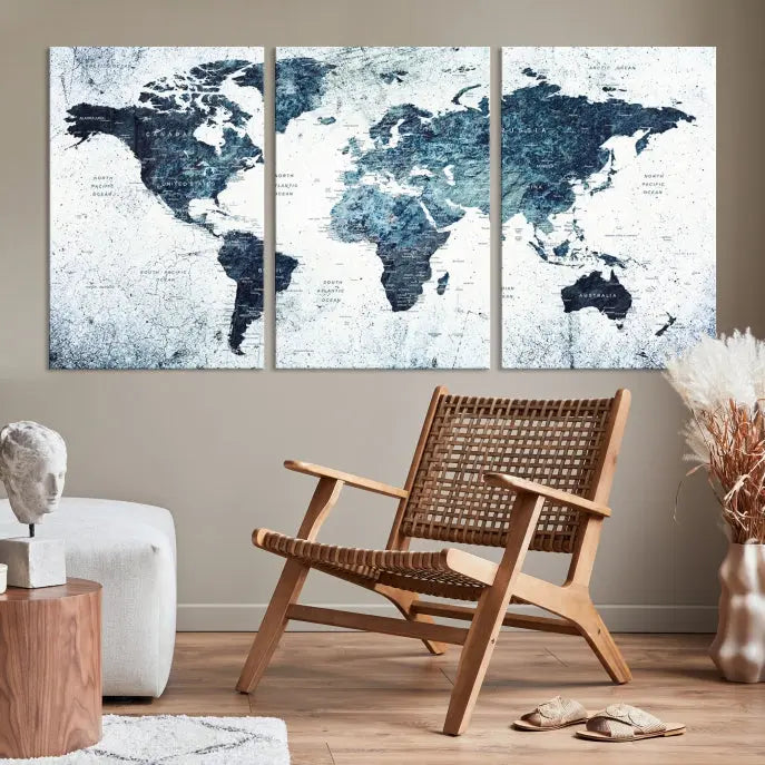 The "Watercolor World Map Wall Art Canvas Print," treated with a UV-protective coating to maintain its vivid colors, is displayed in a modern living room.