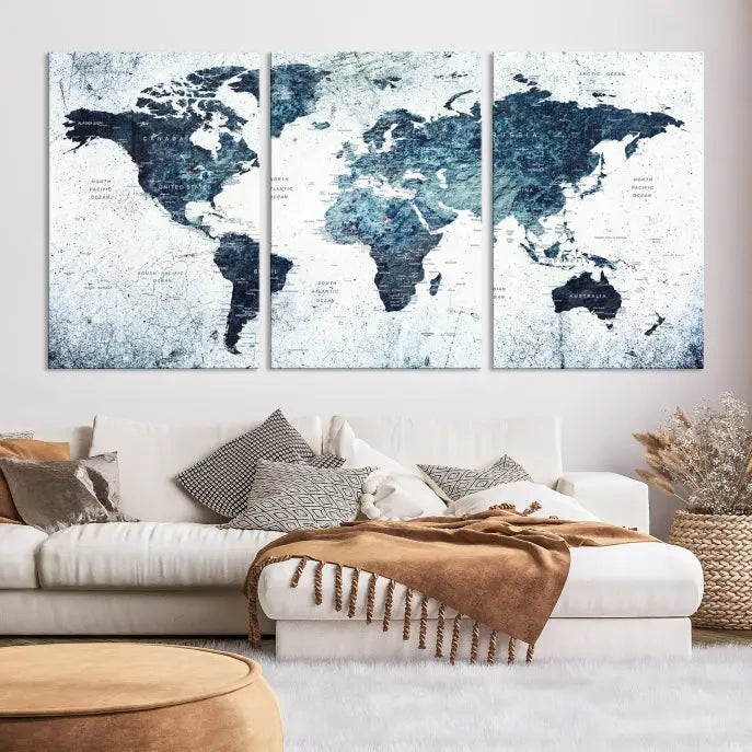 The "Watercolor World Map Wall Art Canvas Print," treated with a UV-protective coating to maintain its vivid colors, is displayed in a modern living room.