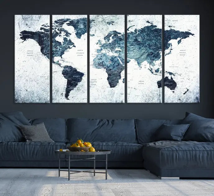 The "Watercolor World Map Wall Art Canvas Print," treated with a UV-protective coating to maintain its vivid colors, is displayed in a modern living room.