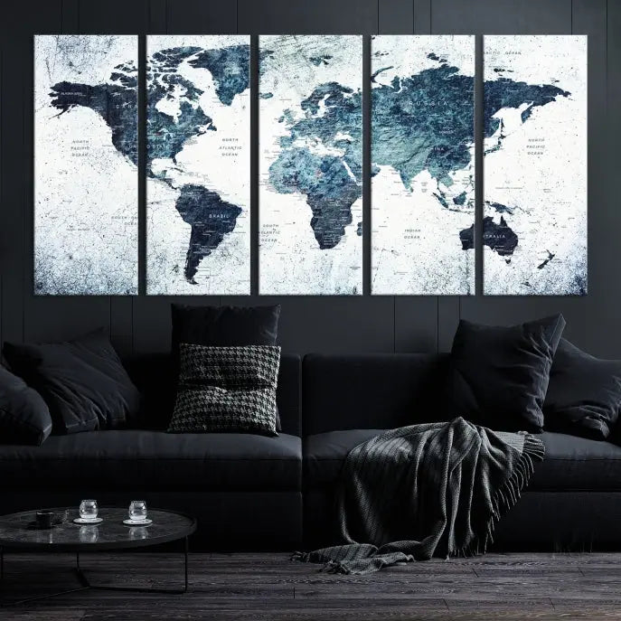 The "Watercolor World Map Wall Art Canvas Print," treated with a UV-protective coating to maintain its vivid colors, is displayed in a modern living room.