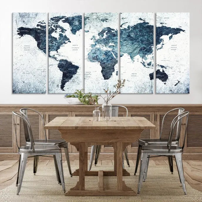 The "Watercolor World Map Wall Art Canvas Print," treated with a UV-protective coating to maintain its vivid colors, is displayed in a modern living room.