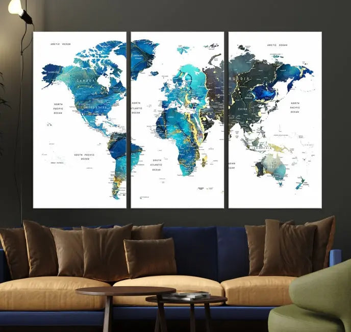 A hand-assembled, three-panel Watercolor World Map Wall Art Canvas Print in shades of blue and green adds a ready-to-hang touch of elegance to the living room.