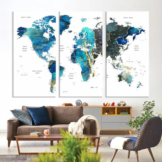 A hand-assembled, three-panel Watercolor World Map Wall Art Canvas Print in shades of blue and green adds a ready-to-hang touch of elegance to the living room.