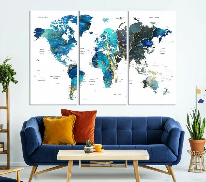 A hand-assembled, three-panel Watercolor World Map Wall Art Canvas Print in shades of blue and green adds a ready-to-hang touch of elegance to the living room.