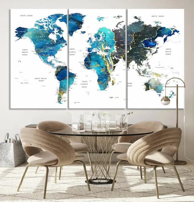 A hand-assembled, three-panel Watercolor World Map Wall Art Canvas Print in shades of blue and green adds a ready-to-hang touch of elegance to the living room.