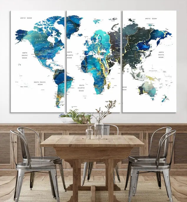 A hand-assembled, three-panel Watercolor World Map Wall Art Canvas Print in shades of blue and green adds a ready-to-hang touch of elegance to the living room.