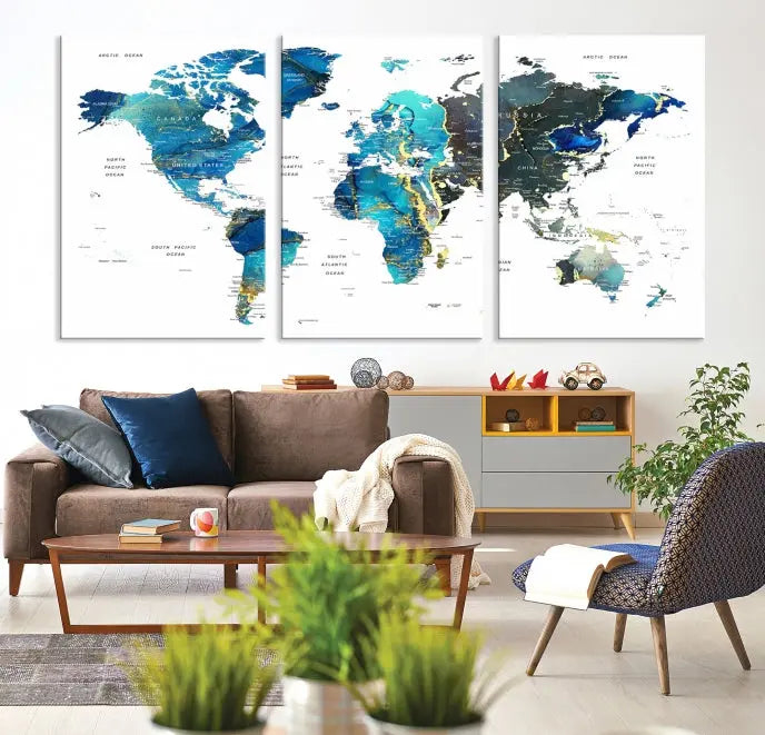 A hand-assembled, three-panel Watercolor World Map Wall Art Canvas Print in shades of blue and green adds a ready-to-hang touch of elegance to the living room.