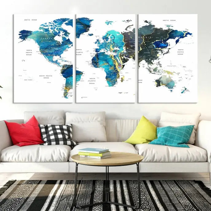 A hand-assembled, three-panel Watercolor World Map Wall Art Canvas Print in shades of blue and green adds a ready-to-hang touch of elegance to the living room.