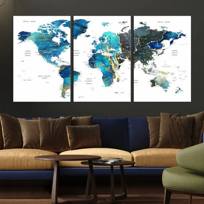 A hand-assembled, three-panel Watercolor World Map Wall Art Canvas Print in shades of blue and green adds a ready-to-hang touch of elegance to the living room.