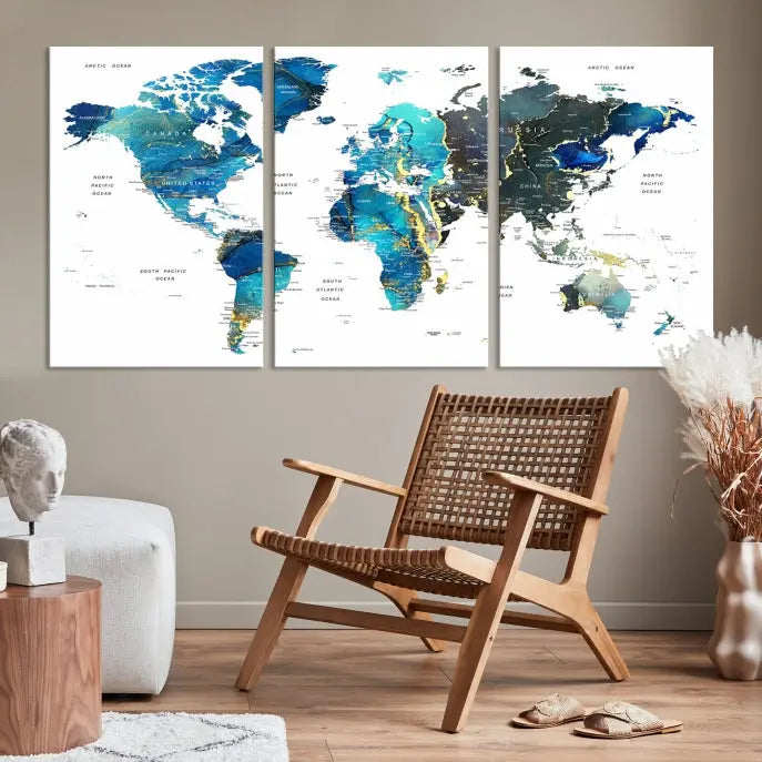 A hand-assembled, three-panel Watercolor World Map Wall Art Canvas Print in shades of blue and green adds a ready-to-hang touch of elegance to the living room.