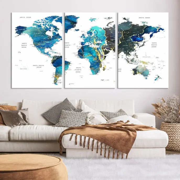 A hand-assembled, three-panel Watercolor World Map Wall Art Canvas Print in shades of blue and green adds a ready-to-hang touch of elegance to the living room.