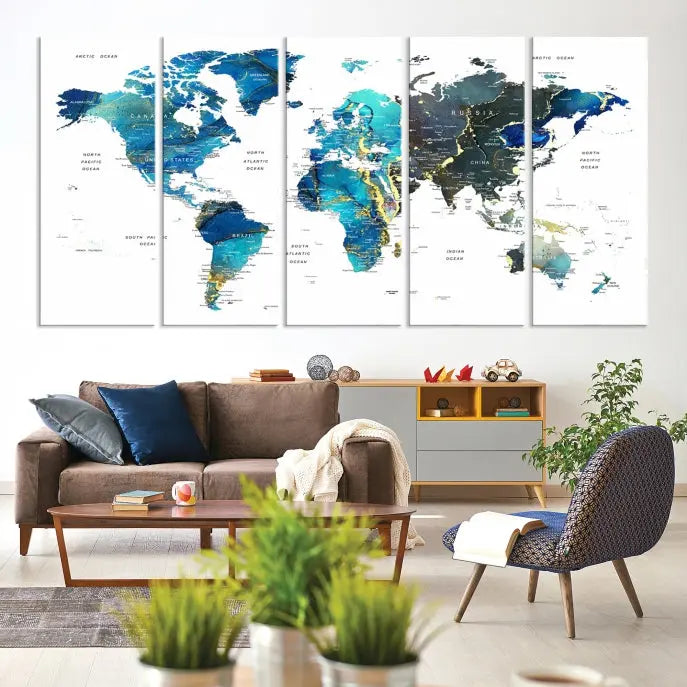 A hand-assembled, three-panel Watercolor World Map Wall Art Canvas Print in shades of blue and green adds a ready-to-hang touch of elegance to the living room.