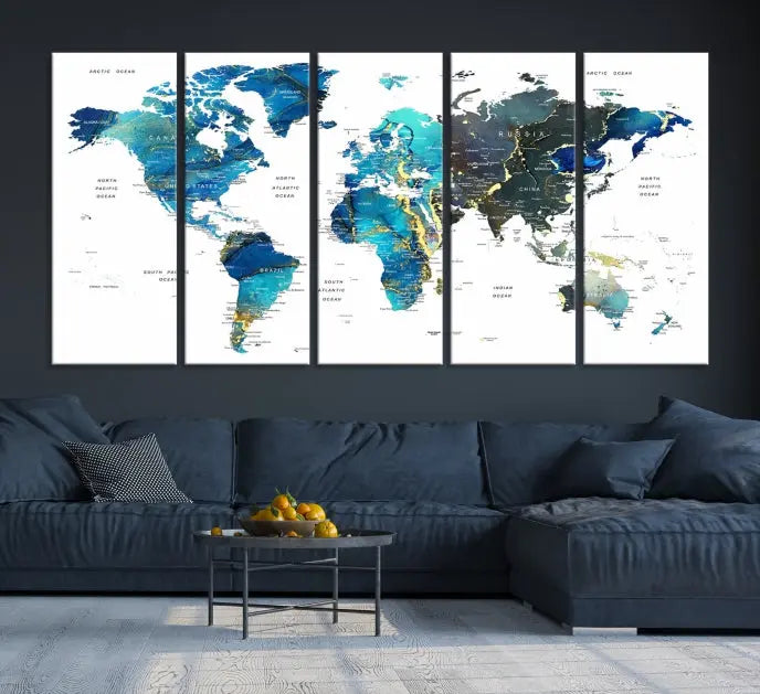 A hand-assembled, three-panel Watercolor World Map Wall Art Canvas Print in shades of blue and green adds a ready-to-hang touch of elegance to the living room.