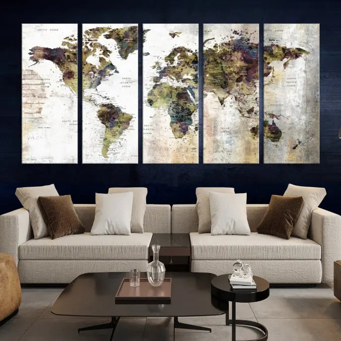 The Watercolor World Map Wall Art Canvas Print adorns the dark wall, creating a striking focal point.