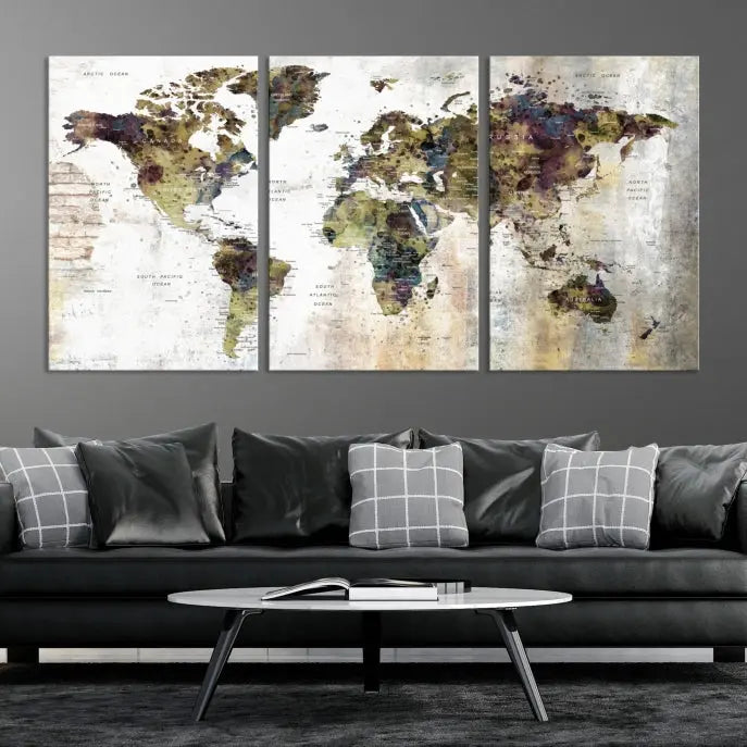 The Watercolor World Map Wall Art Canvas Print adorns the dark wall, creating a striking focal point.