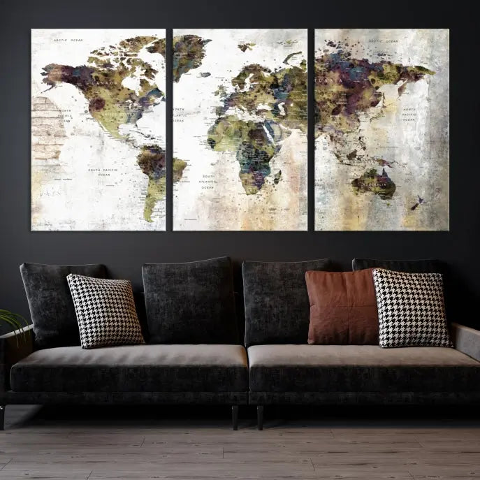 The Watercolor World Map Wall Art Canvas Print adorns the dark wall, creating a striking focal point.