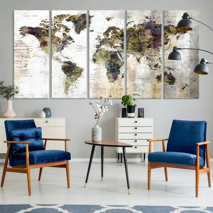 The Watercolor World Map Wall Art Canvas Print adorns the dark wall, creating a striking focal point.