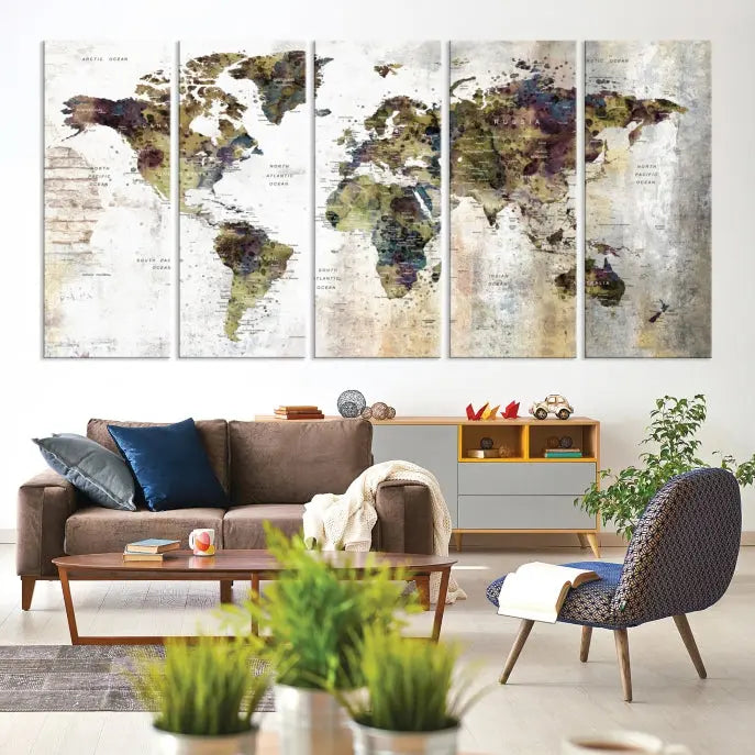 The Watercolor World Map Wall Art Canvas Print adorns the dark wall, creating a striking focal point.