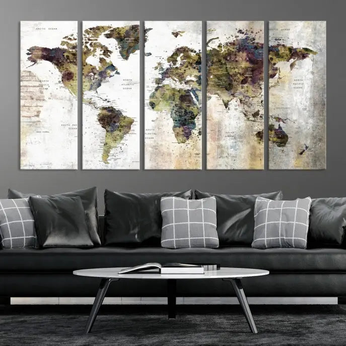 The Watercolor World Map Wall Art Canvas Print adorns the dark wall, creating a striking focal point.