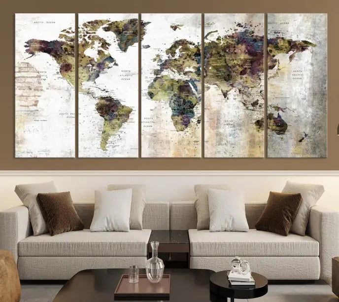 The Watercolor World Map Wall Art Canvas Print adorns the dark wall, creating a striking focal point.