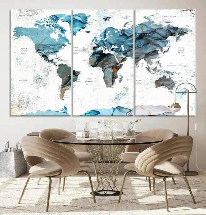 The Watercolor World Map Wall Art Canvas Print features a stunning triptych design on museum-quality canvases in shades of blue. Its gallery-wrapped presentation adds an elegant touch to the living room.