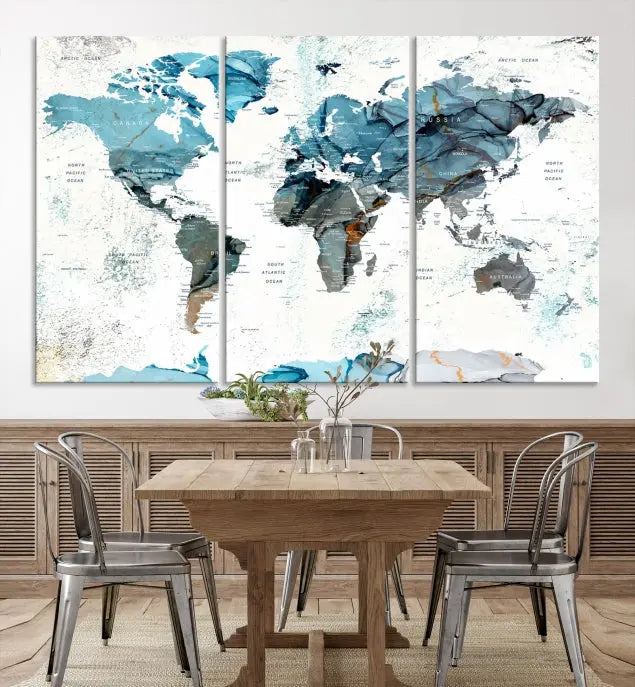 The Watercolor World Map Wall Art Canvas Print features a stunning triptych design on museum-quality canvases in shades of blue. Its gallery-wrapped presentation adds an elegant touch to the living room.