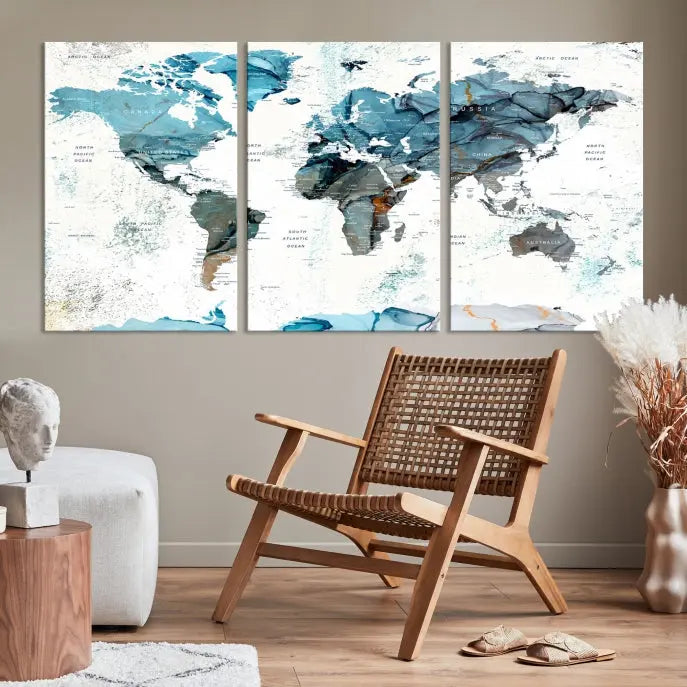 The Watercolor World Map Wall Art Canvas Print features a stunning triptych design on museum-quality canvases in shades of blue. Its gallery-wrapped presentation adds an elegant touch to the living room.