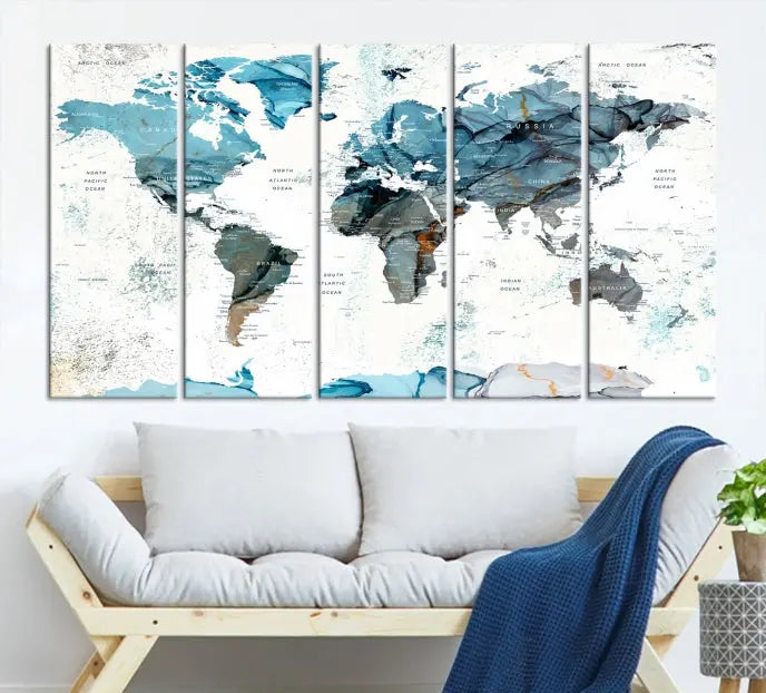 The Watercolor World Map Wall Art Canvas Print features a stunning triptych design on museum-quality canvases in shades of blue. Its gallery-wrapped presentation adds an elegant touch to the living room.