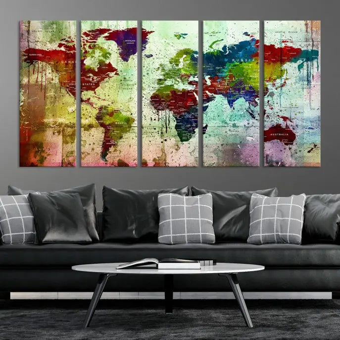 A vibrant Watercolor World Map Wall Art Canvas Print adorns the space above.